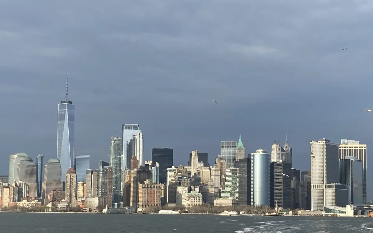 Lower Manhattan and One World Trade Center viewed across the water from a ferry